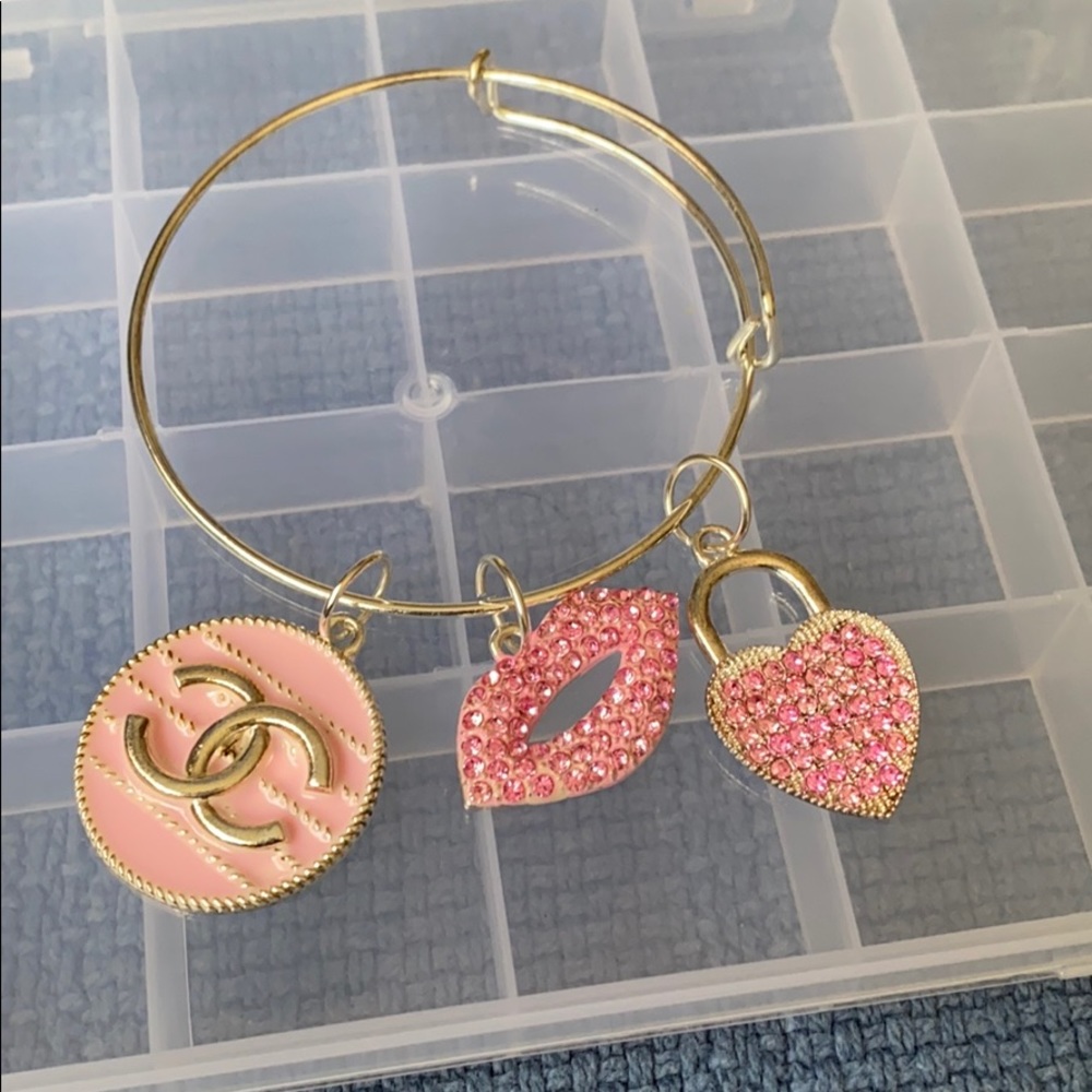 Silver plated bangle with charms